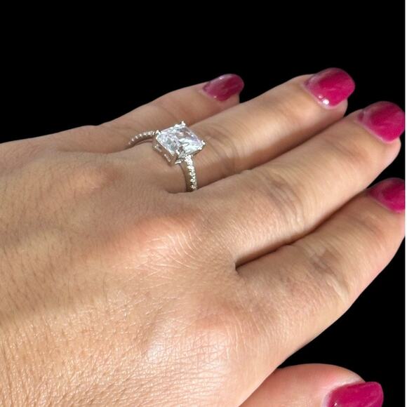 Elegant Women's Engagement Ring Emerald-Shaped Cubic ZirconiaTimeless Sparkle - Picture 10 of 13